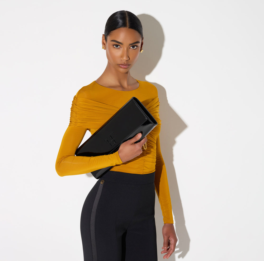Patent leather clutch bag