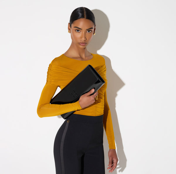 Patent leather clutch bag
