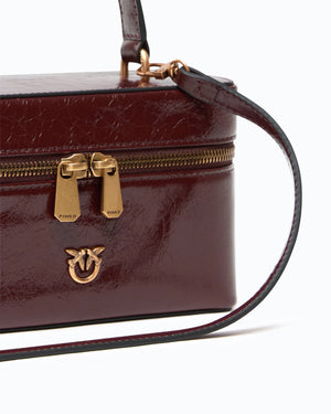 Small crossbody bag in glossy leather