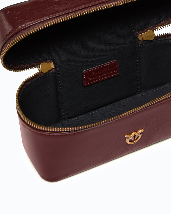 Small crossbody bag in glossy leather