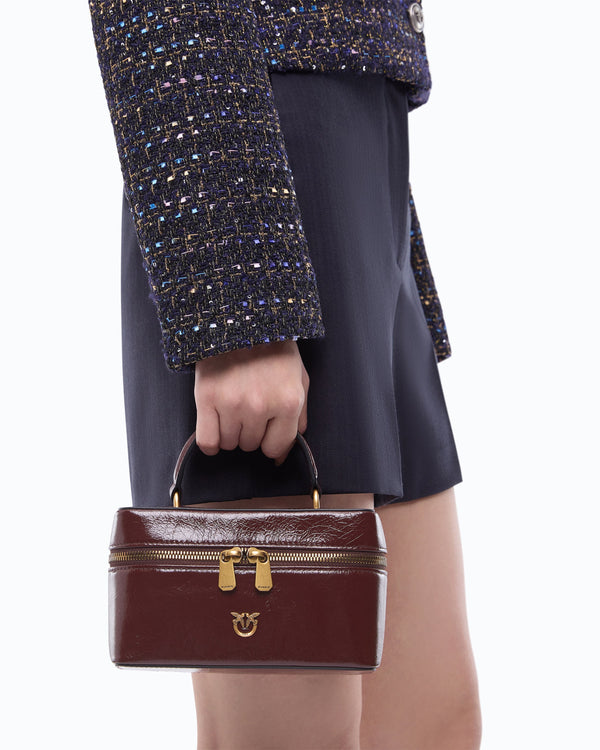 Small crossbody bag in glossy leather