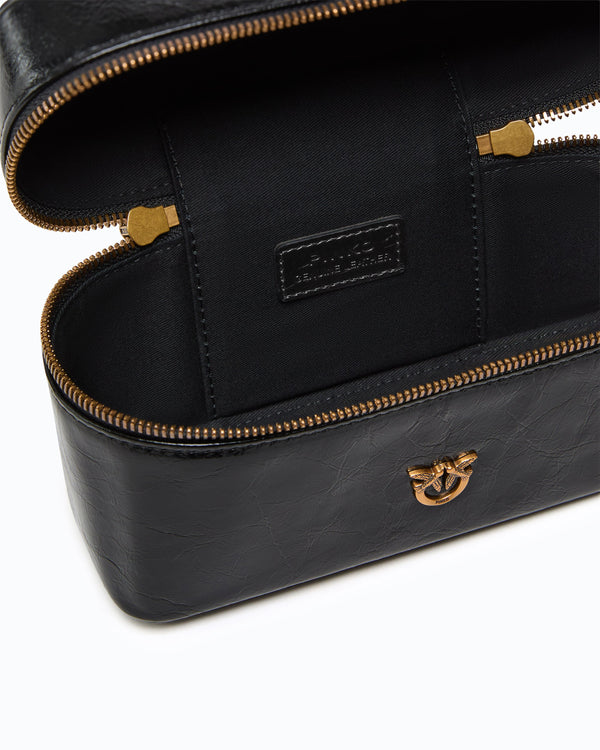 Small crossbody bag in glossy leather