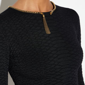Knit top with snake pattern