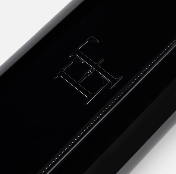 Patent leather clutch bag
