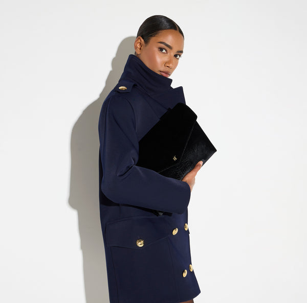Over-the-shoulder bag made from velvet with a crocodile print texture