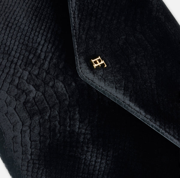 Over-the-shoulder bag made from velvet with a crocodile print texture