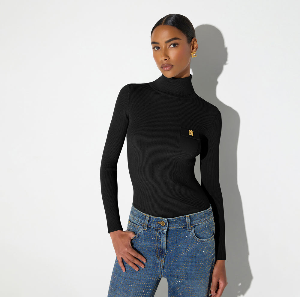 Knit turtleneck top with openwork embroideries