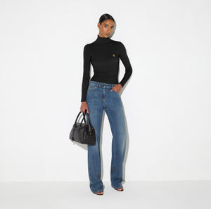 Knit turtleneck top with openwork embroideries