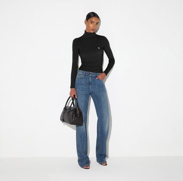 Knit turtleneck top with openwork embroideries
