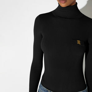 Knit turtleneck top with openwork embroideries