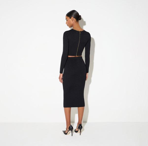 Knit top with snake pattern